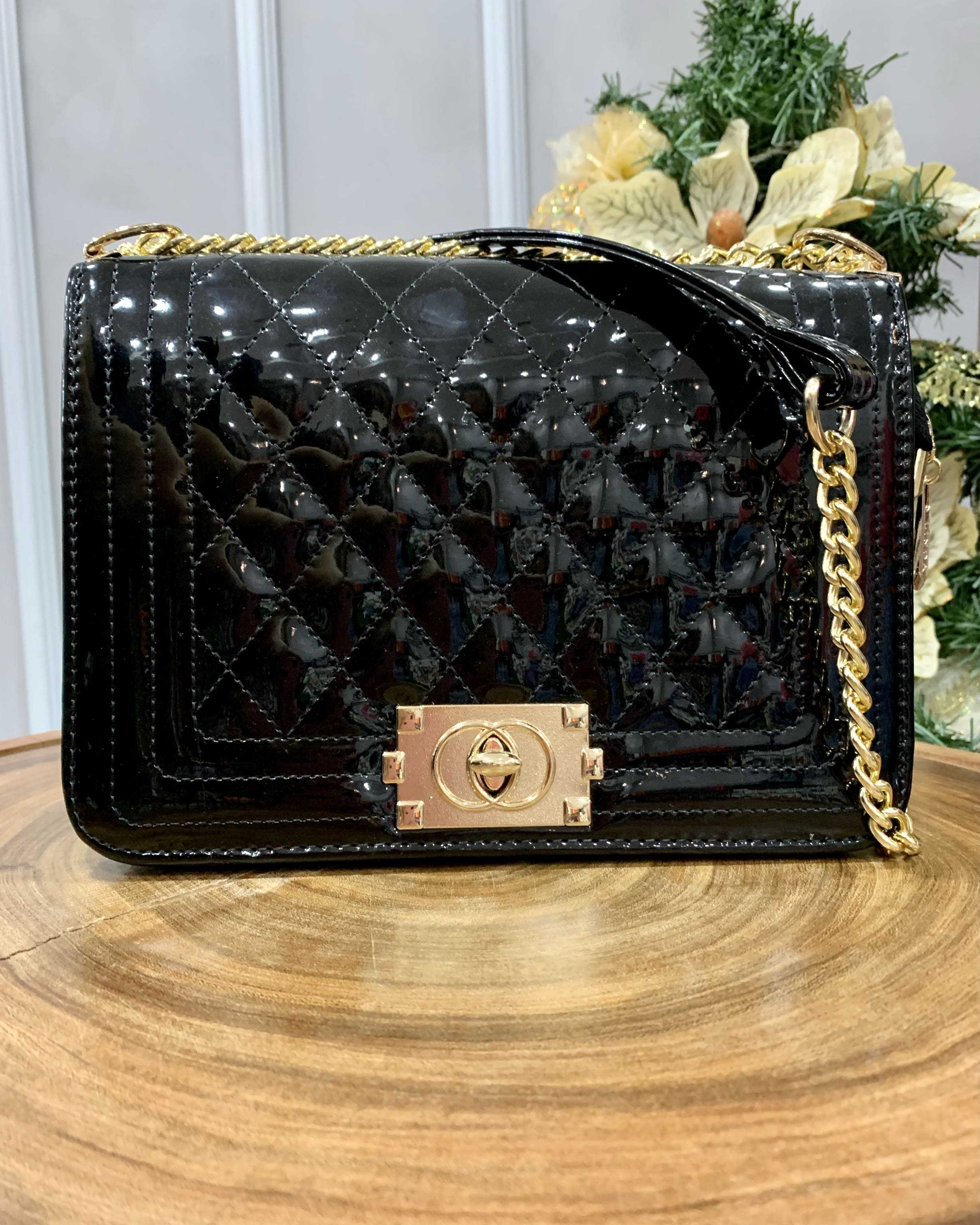 black bolsa with black hardware